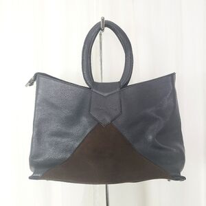 Tiffany & Fred Paris black pebbled leather brown suede handbag